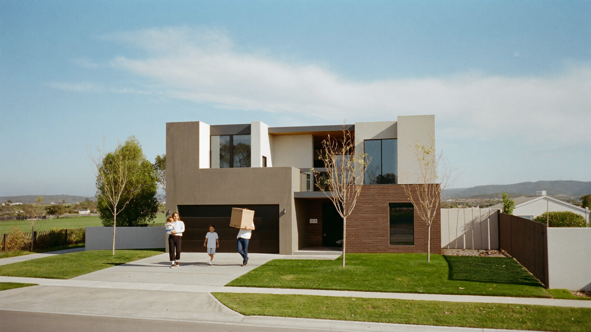 A young family moving into their new home in Craigieburn West